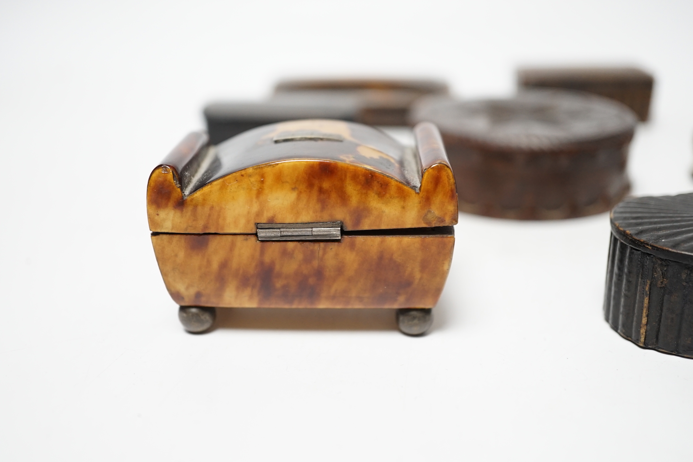 A collection of ten snuff boxes in tortoiseshell, treen or horn, etc.